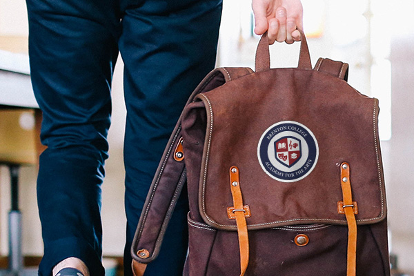 Custom school logo patch on a backpack