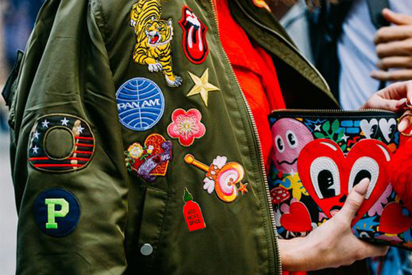 DIY Enamel pins and badges on a denim jacket