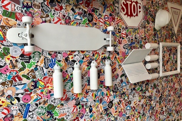 Sticker bomb wall with white objects
