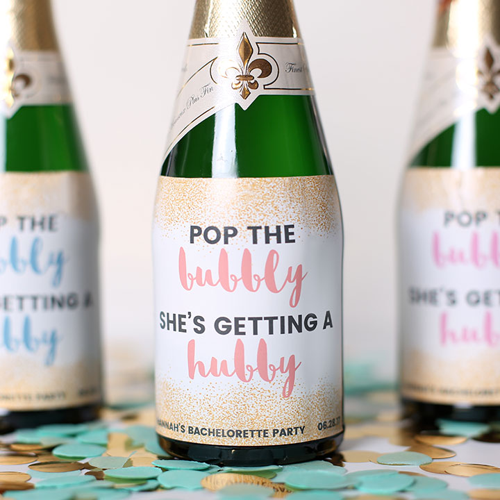 Custom wedding labels on champagne bottles