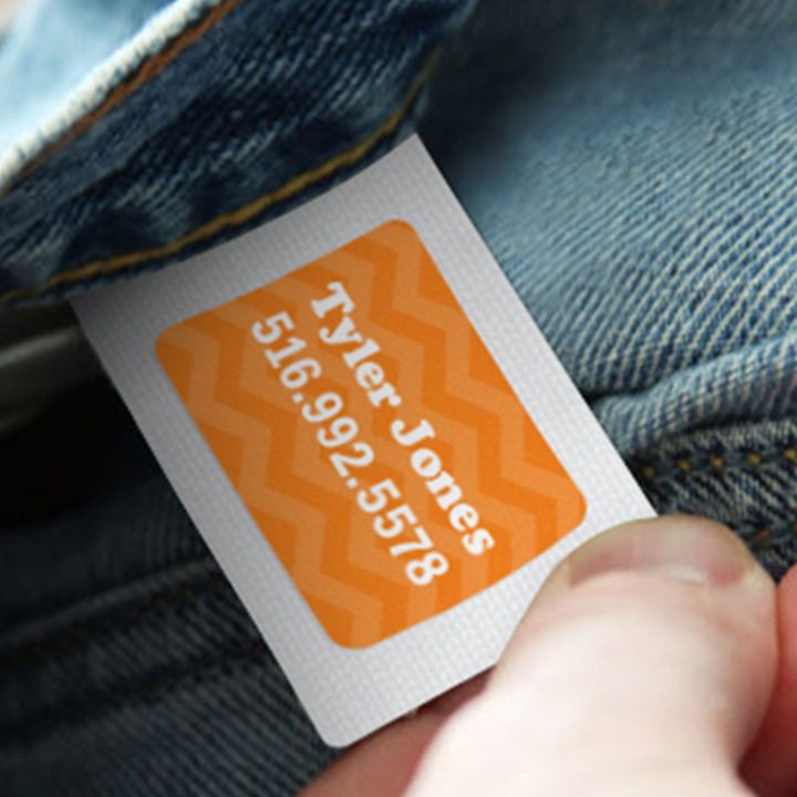 Stick-on clothing label on a clothing tag