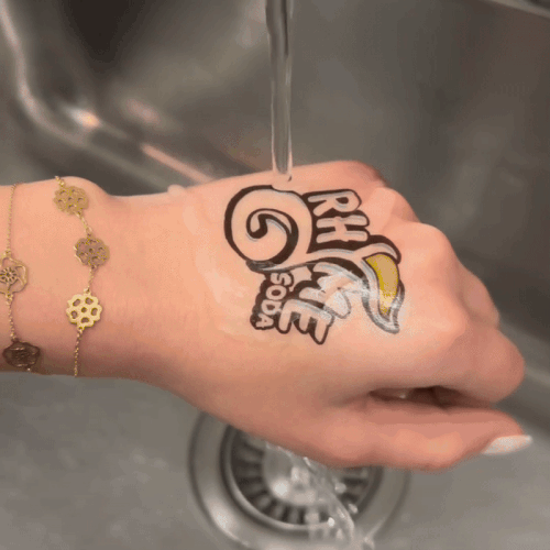 tattoo under a stream of water